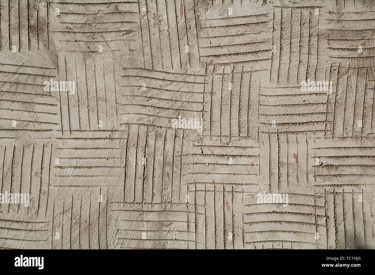 Grunge cracked gray plaster surface texture Stock Photo