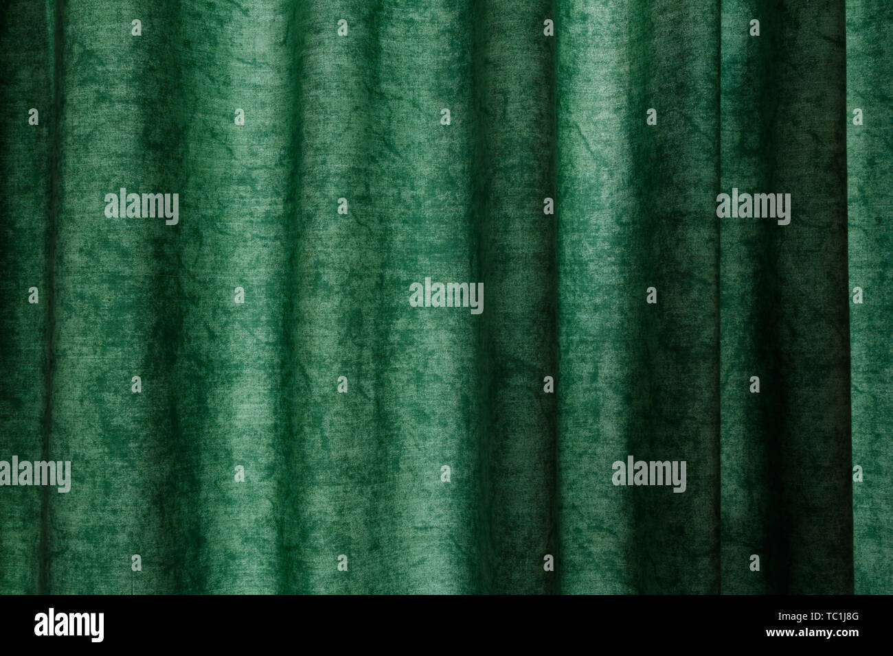 Patterned green fabric textile curtain Stock Photo