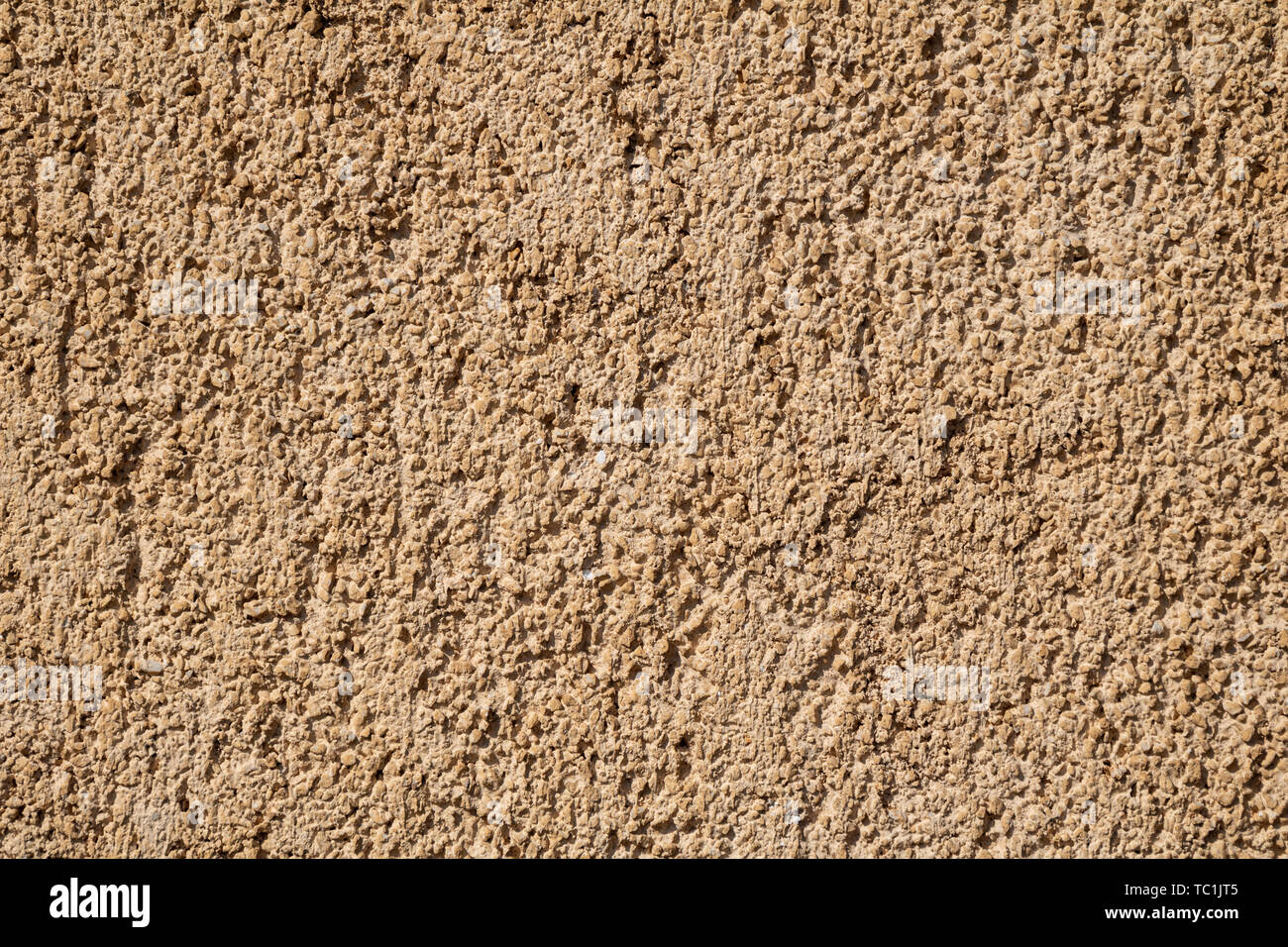 Yellow grunge rough wall surface texture Stock Photo