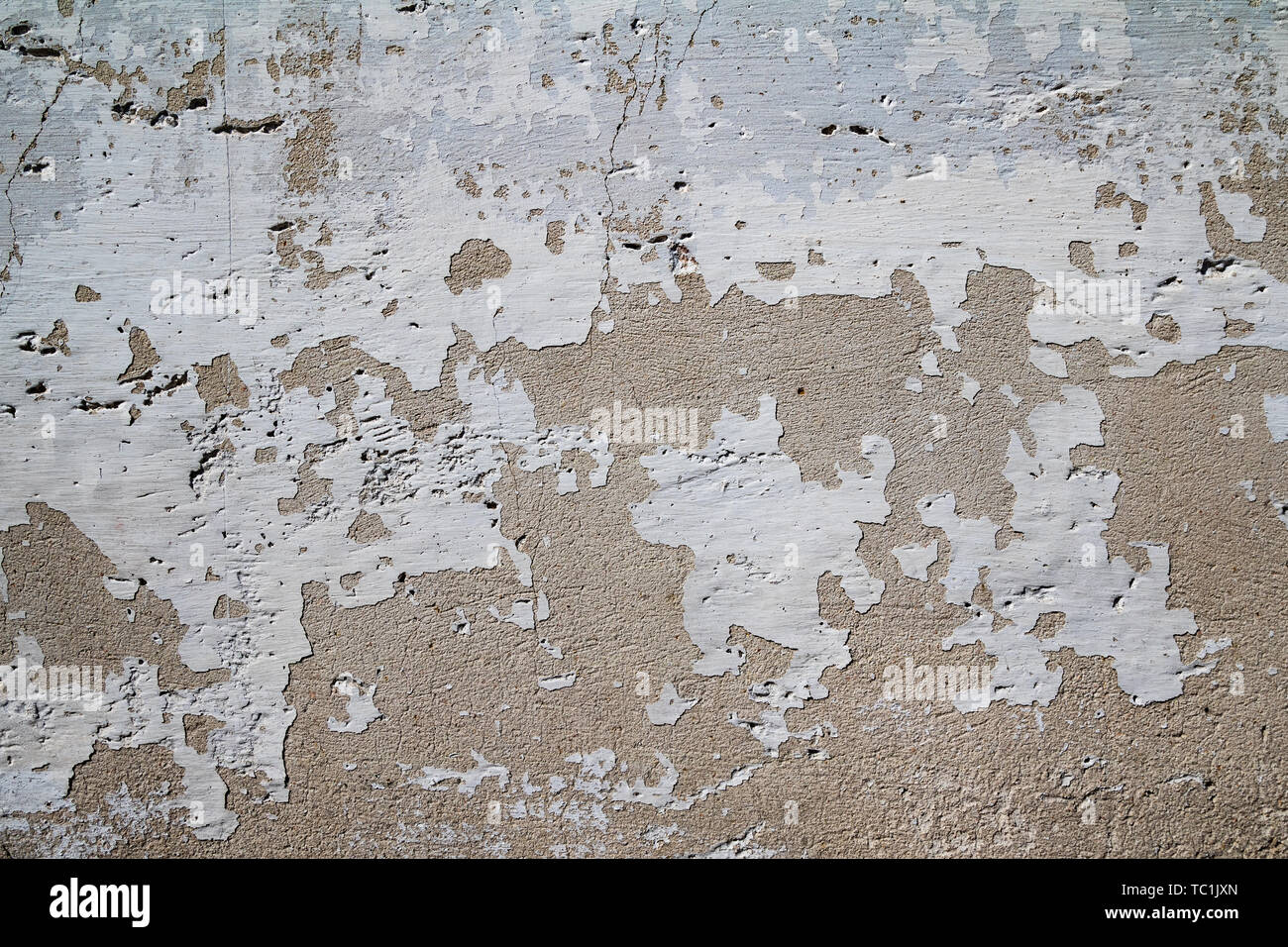 Cracked white wall surface texture Stock Photo