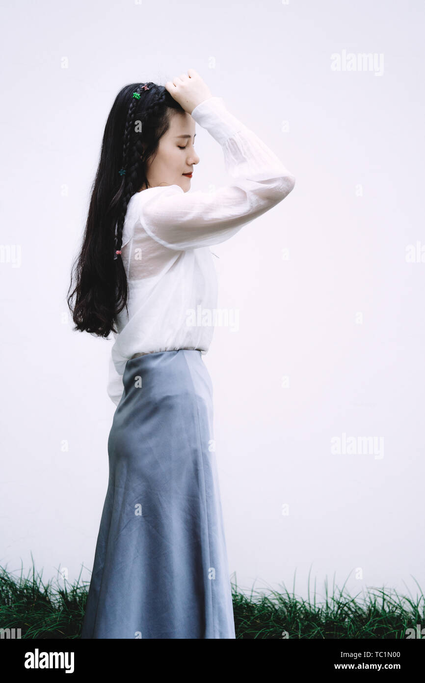 Pure color background fresh girl Stock Photo - Alamy