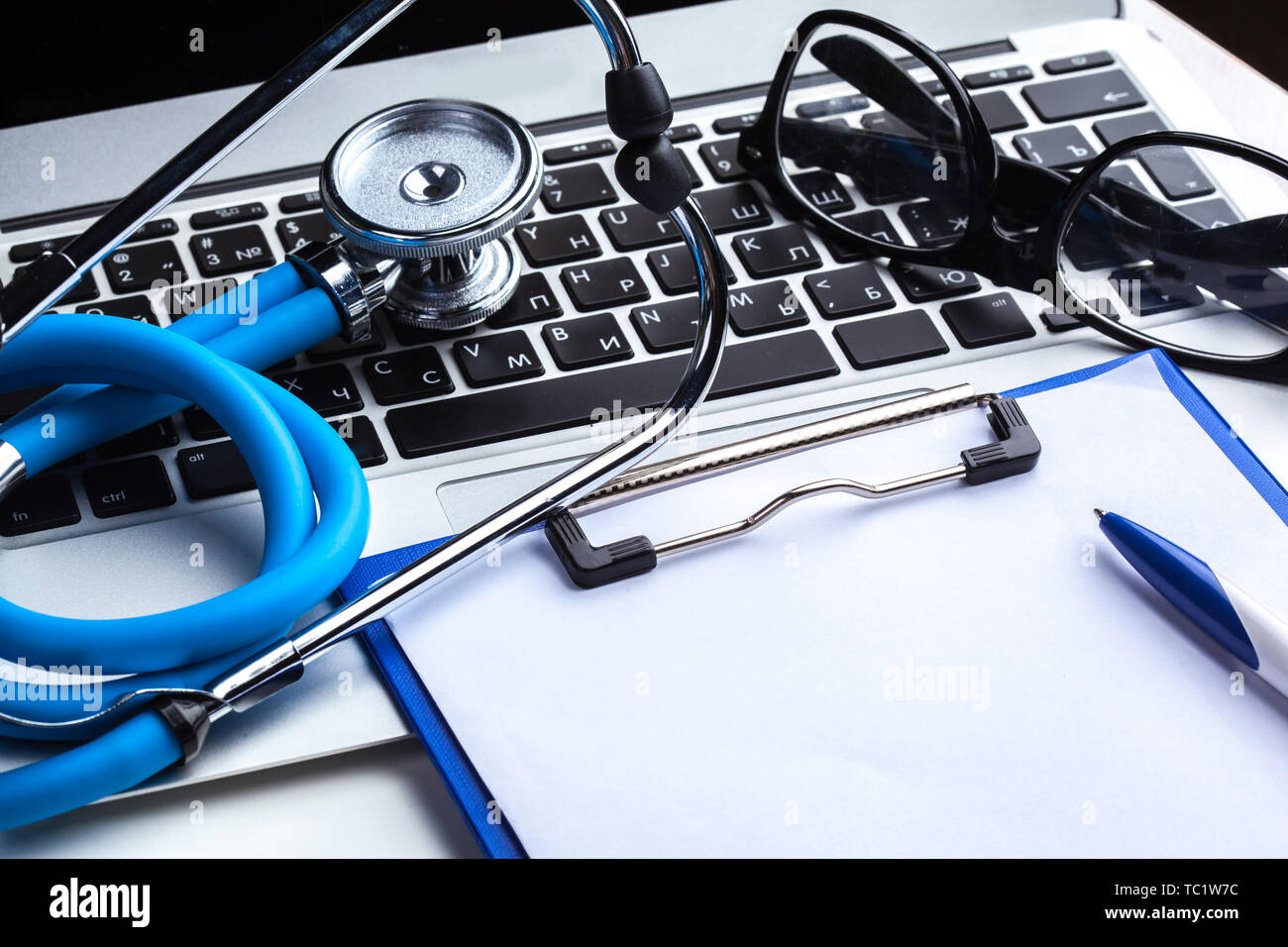 Medical stethoscope on computer keyboard Stock Photo - Alamy