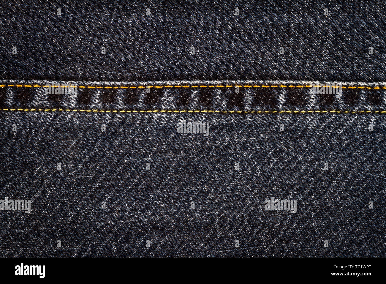 Black jeans texture. Denim jeans fabric background with a seam Stock ...