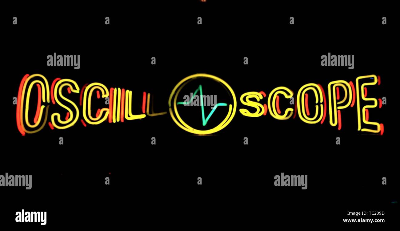 Night view of neon sign advertising Oscilloscope Laboratories film