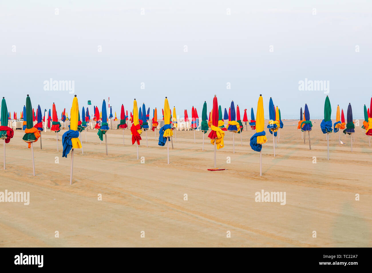 The famous colorful parasols on Deauville beach, Normandy, France Stock Photo