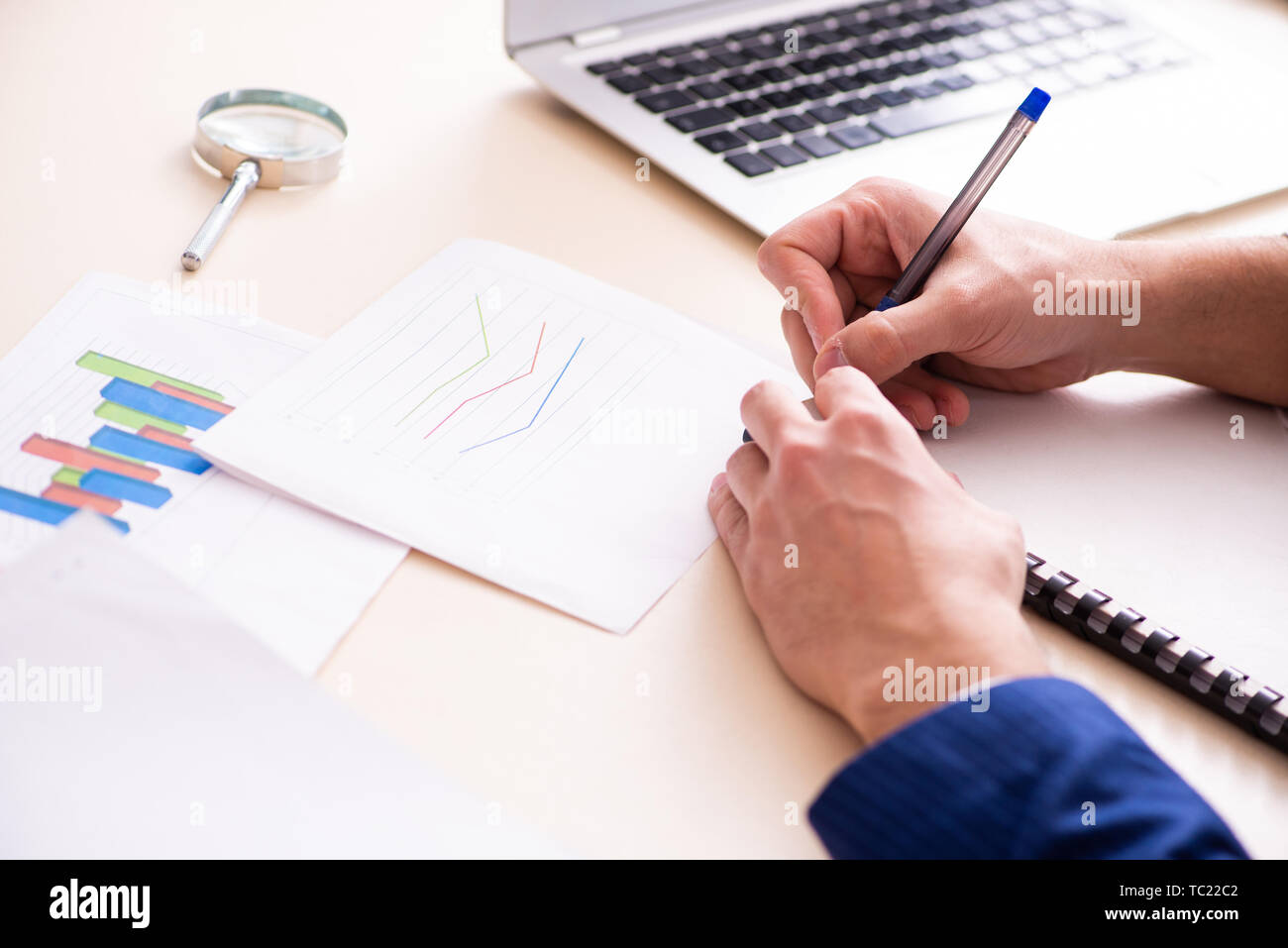 Data analyst writing office desk hi-res stock photography and images ...
