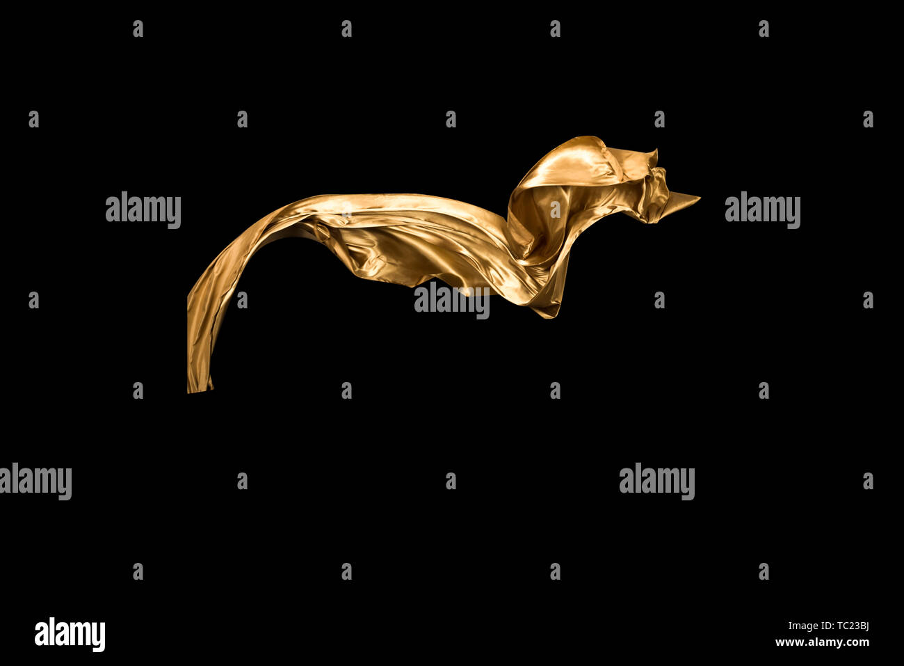 golden soft satin flying in wind on background Stock Photo