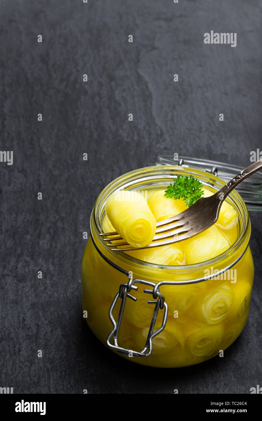 Marinated daikon on black stone background Stock Photo Alamy