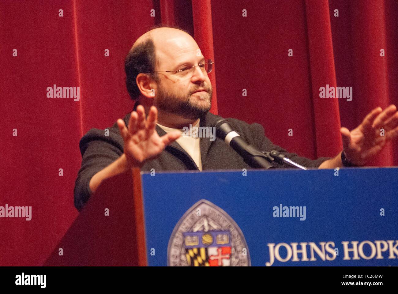Actor and comedian Jason Alexander speaks from a podium during a Milton S Eisenhower Symposium, Homewood Campus of Johns Hopkins University, Baltimore, Maryland, October 13, 2006. From the Homewood Photography Collection. () Stock Photo