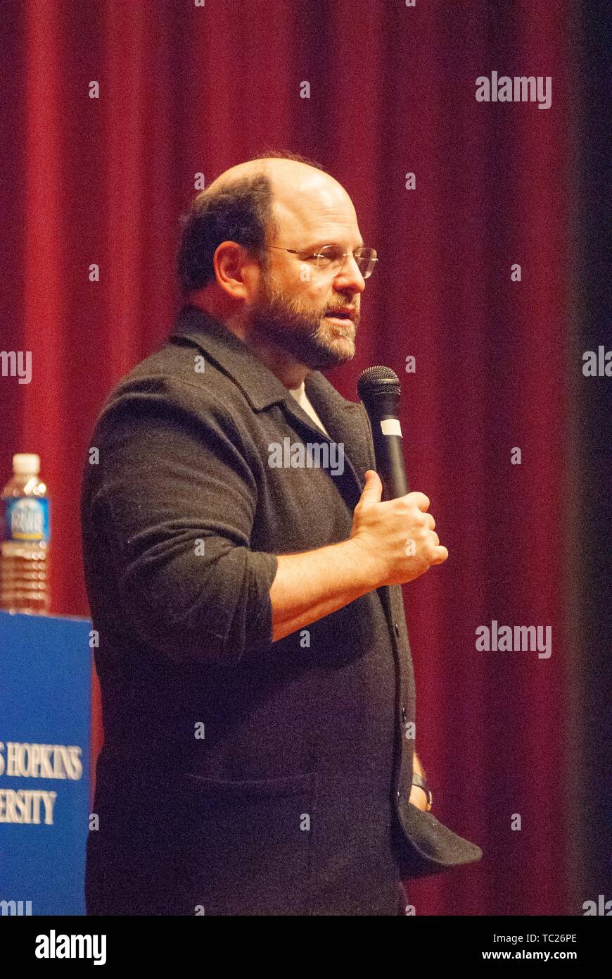 Profile shot of actor and comedian Jason Alexander speaking during a Milton S Eisenhower Symposium, Homewood Campus of Johns Hopkins University, Baltimore, Maryland, October 13, 2006. From the Homewood Photography Collection. () Stock Photo