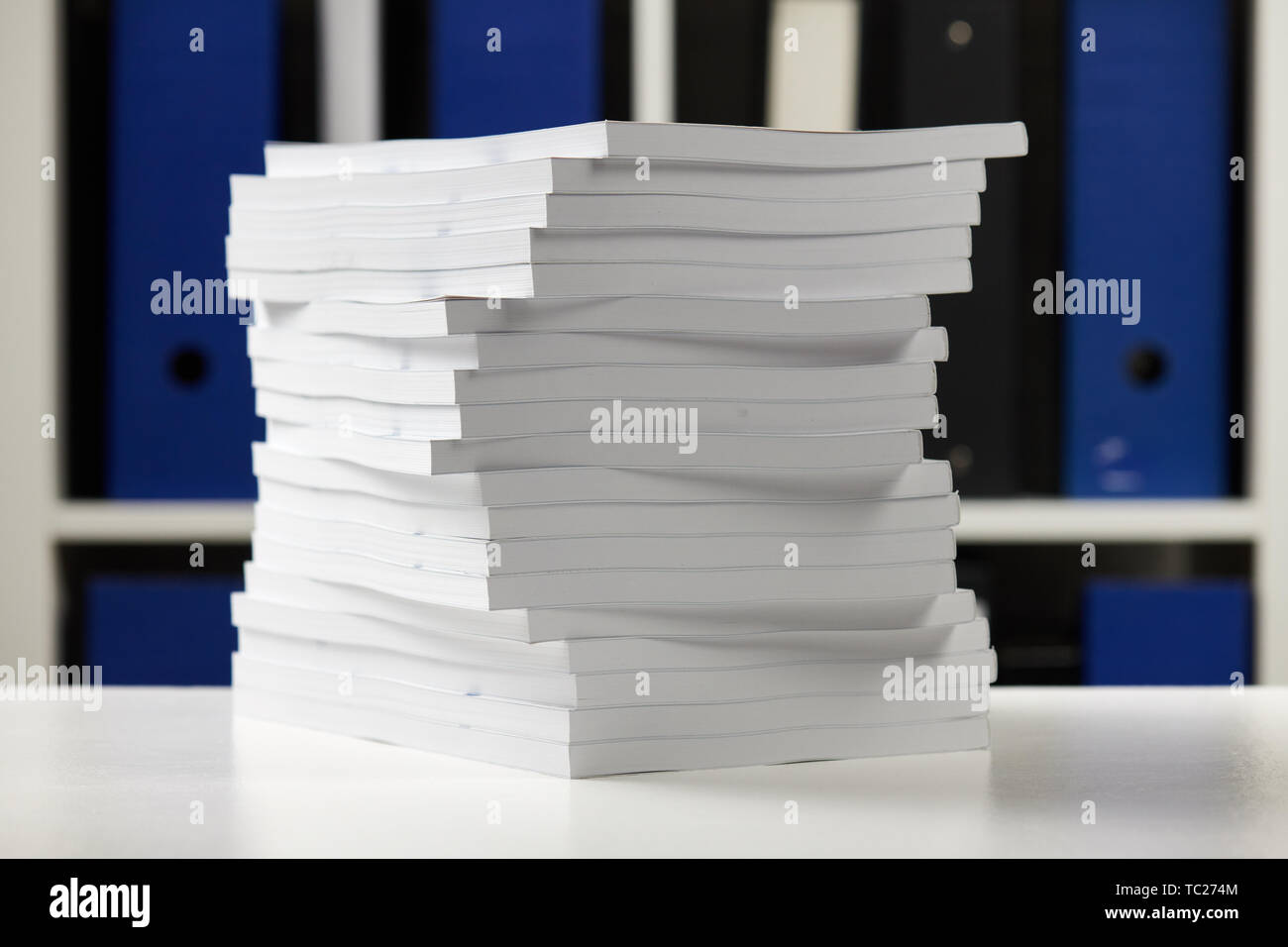 Stack of books and shelves with folders. Business financial accounting ...