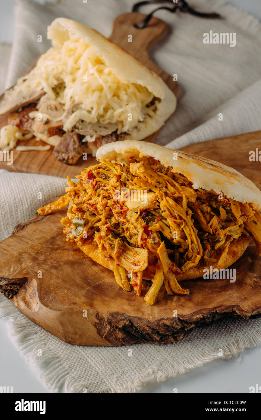 Typical Colombian dish for breakfast, roasted chicken arepa Stock Photo