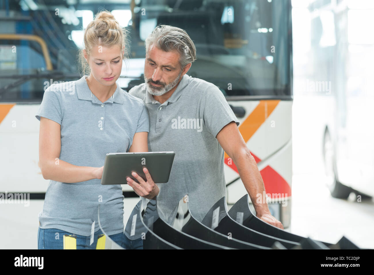 mechanics using a digital tablet Stock Photo