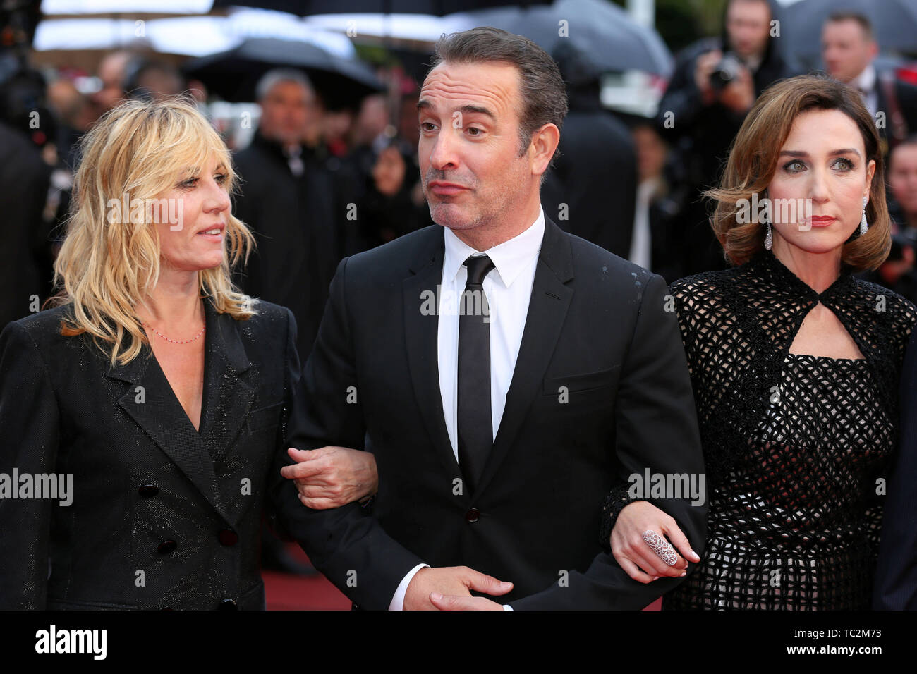 CANNES, FRANCE - MAY 18: Emmanuelle Seigner, Jean Dujardin and Elsa Zylberstein attend the screening of 'Les Plus Belles Annees d'une Vie' during the  Stock Photo