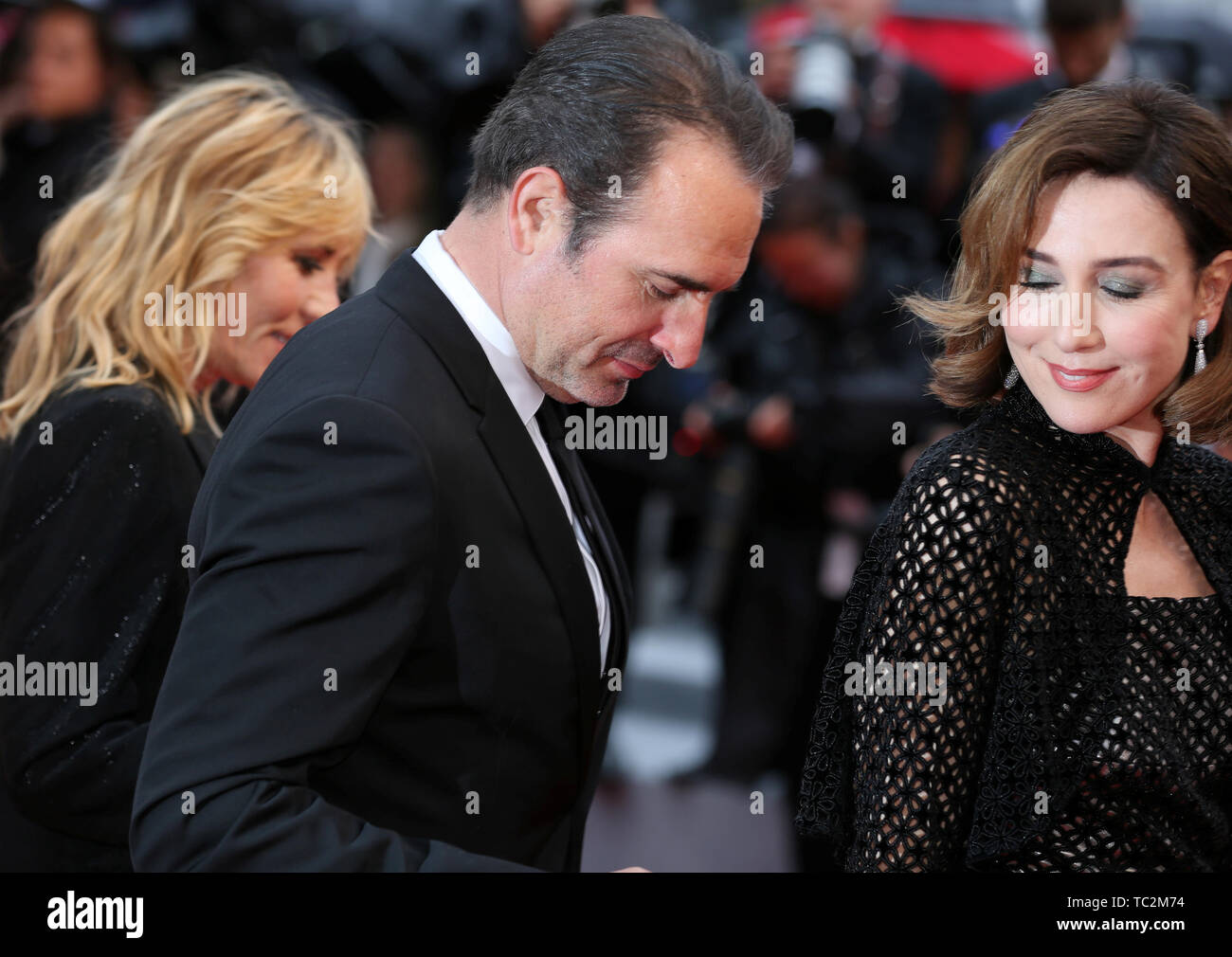 CANNES, FRANCE - MAY 18: Emmanuelle Seigner, Jean Dujardin and Elsa Zylberstein attend the screening of 'Les Plus Belles Annees d'une Vie' during the  Stock Photo