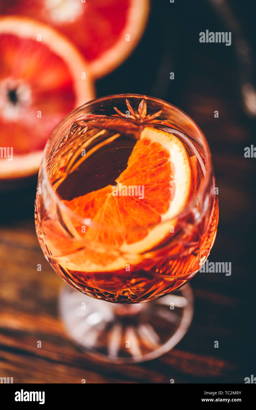 Orange whiskey sour cocktail with bourbon, blood orange juice and