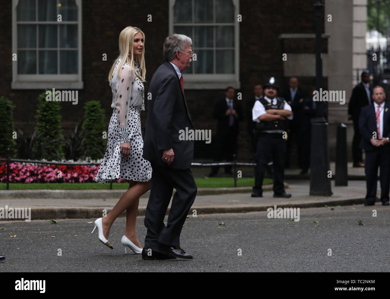 London, UK. 04th June, 2019. Ivanka Trump (White House advisor and first daughter of the United States), walks behind John Bolton (National Security Advisor), after leaving Number 10 Downing Street. The President met The Prime Minister during his state visit to the UK. Donald Trump, State visit, Downing Street, London, UK on June 4, 2019. Credit: Paul Marriott/Alamy Live News Stock Photo