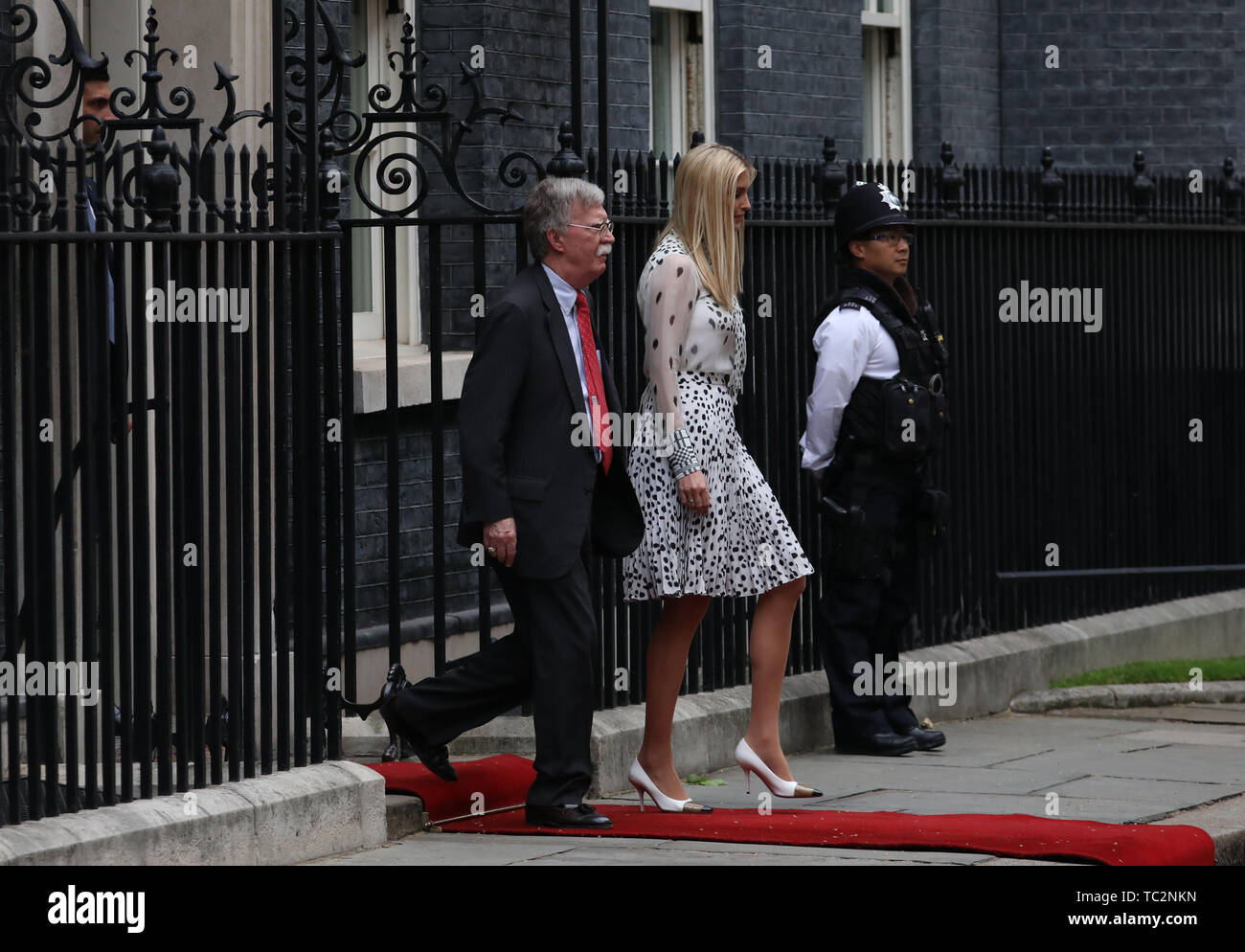London, UK. 04th June, 2019. Ivanka Trump (White House advisor and first daughter of the United States), walks behind John Bolton (National Security Advisor), after leaving Number 10 Downing Street. The President met The Prime Minister during his state visit to the UK. Donald Trump, State visit, Downing Street, London, UK on June 4, 2019. Credit: Paul Marriott/Alamy Live News Stock Photo