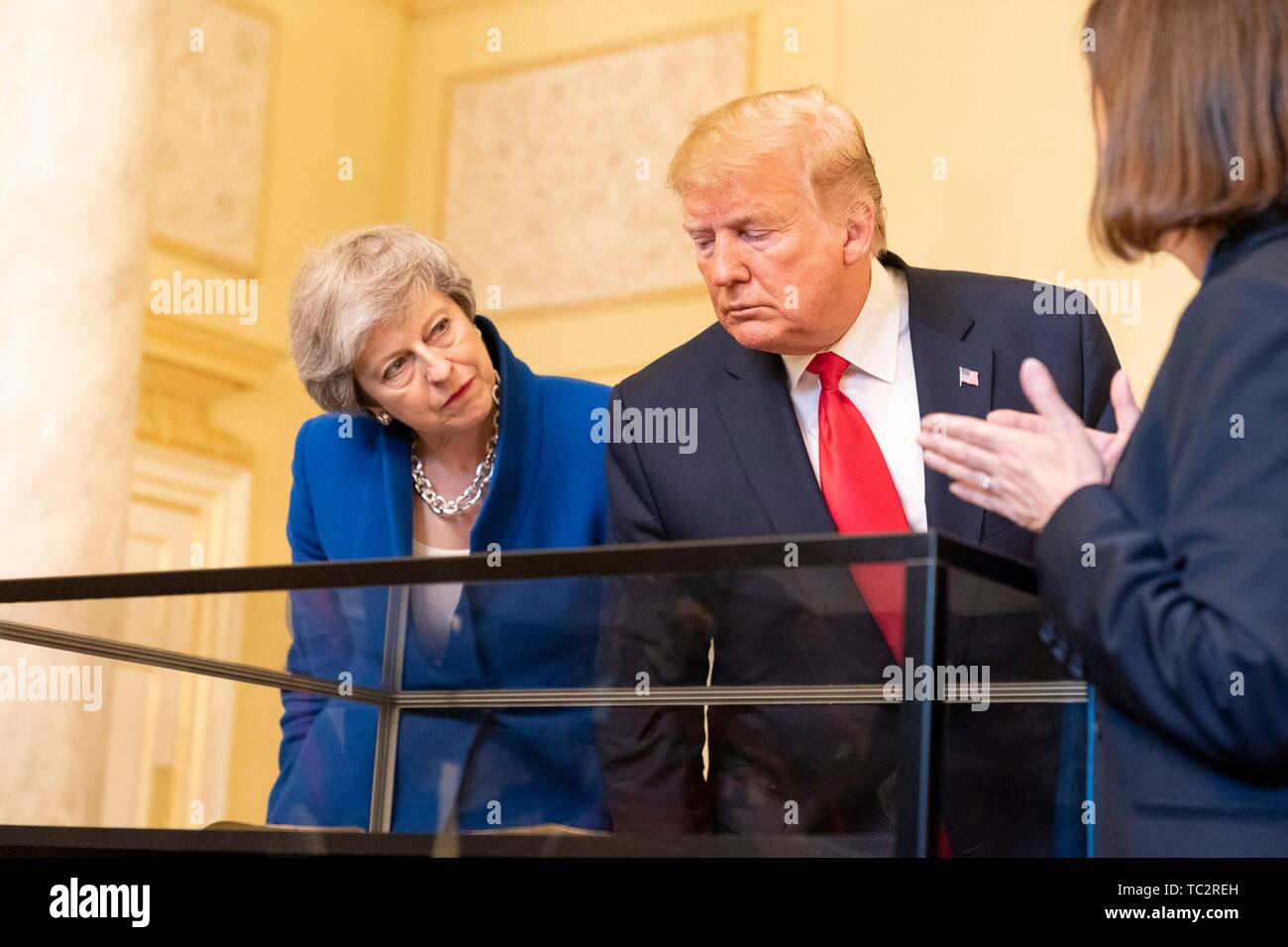 London, UK. 04th June, 2019. U.S President Donald Trump and outgoing British Prime Minister Theresa May view an original copy of the U.S. Declaration of Independence during a tour of historic documents at #10 Downing Street June 4, 2019 in London, England. The handwritten parchment copy of the U.S. Declaration of Independence, known as the Sussex Declaration, is one of only two known to exist. Credit: Planetpix/Alamy Live News Stock Photo
