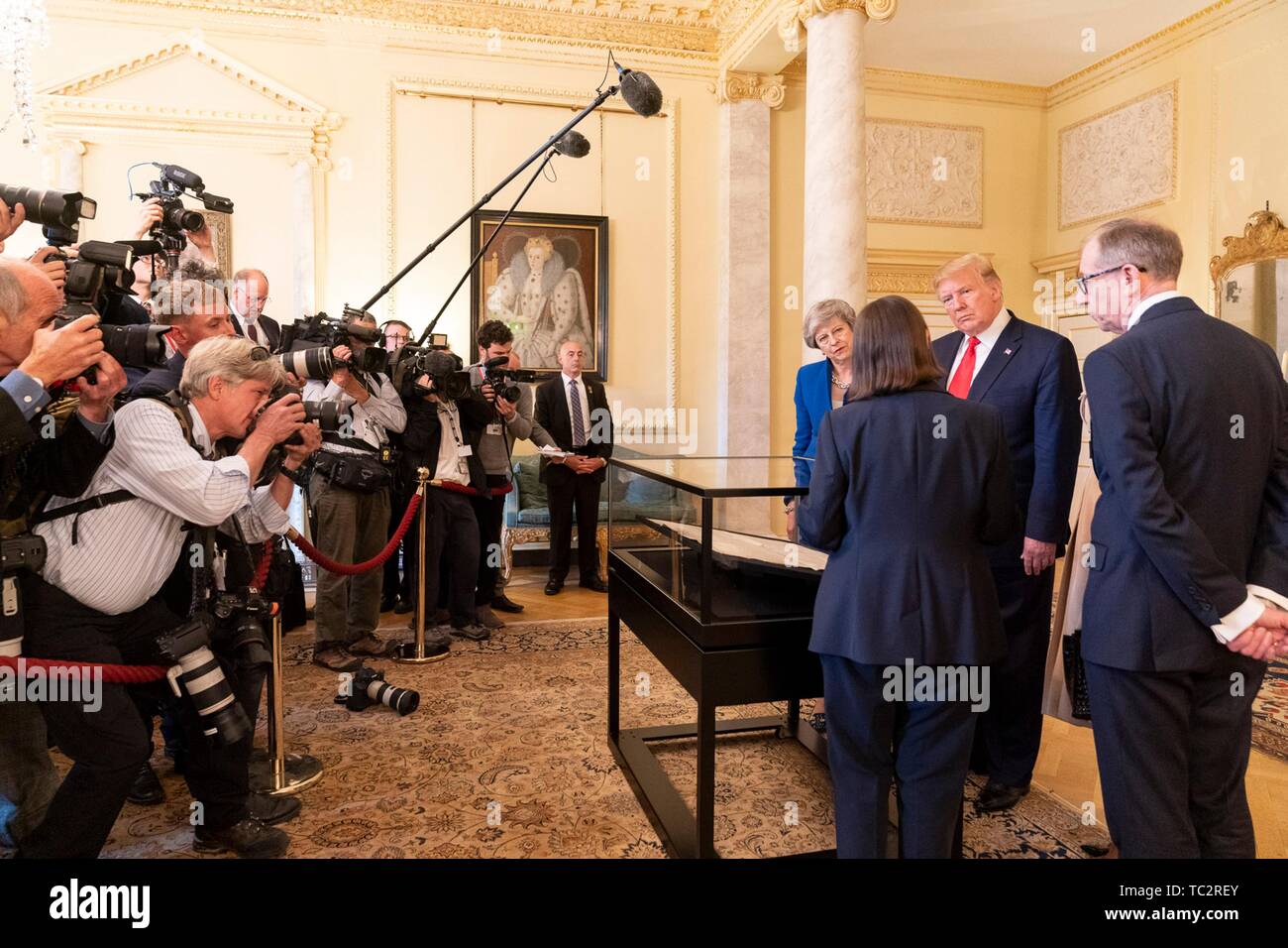 London, UK. 04th June, 2019. U.S President Donald Trump outgoing British Prime Minister Theresa May and her husband Philip May, right, view an original copy of the U.S. Declaration of Independence during a tour of historic documents at #10 Downing Street June 4, 2019 in London, England. The handwritten parchment copy of the U.S. Declaration of Independence, known as the Sussex Declaration, is one of only two known to exist. Credit: Planetpix/Alamy Live News Stock Photo