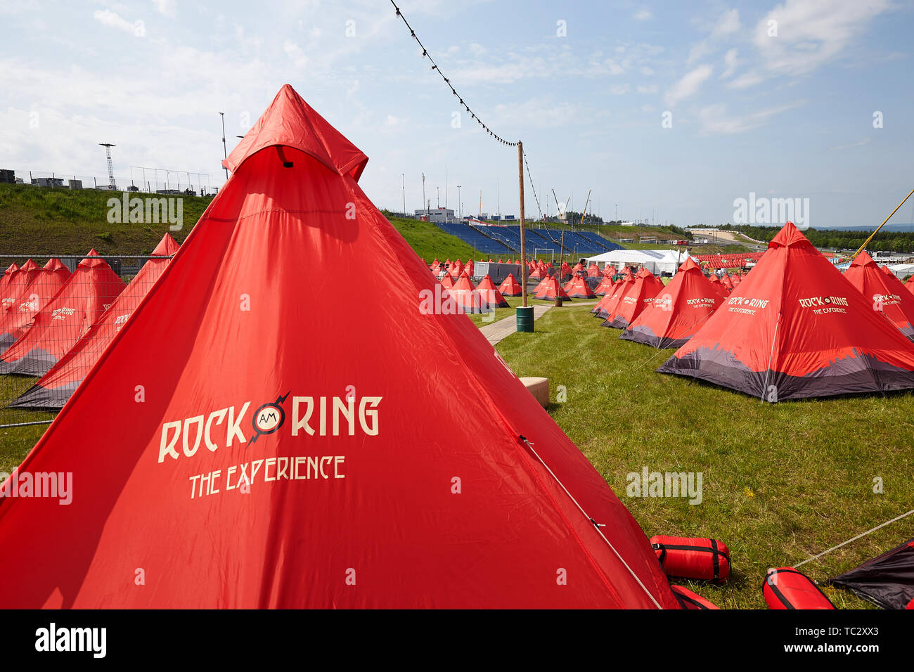 04 June 2019, Rhineland-Palatinate, Nürburg: The construction of the tents  for the music festival "Rock am Ring" at the race track in the Eifel has  begun. The three-day music programme begins on