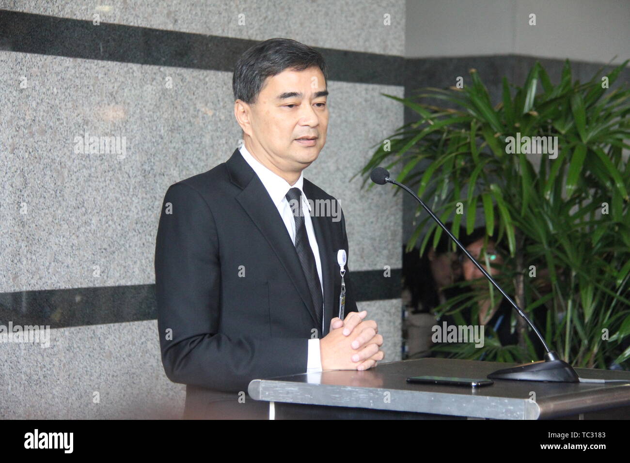 (190605) -- BANGKOK, June 5, 2019 (Xinhua) -- Thailand's former prime minister, former Democrat Party leader Abhisit Vejjajiva speaks at the TOT Public Company Limited's head office in northern Bangkok, Thailand, on June 5, 2019. Abhisit annouced his resignation as MP, before voting for the new prime minister of Thailand on Wednesday. He apologized to all the people who had voted for his party and candidates in the nationwide election for the failure to put his pledged standpoint to work. A joint House of Representatives and Senate meeting is going on Wednesday during which 500 lower house rep Stock Photo