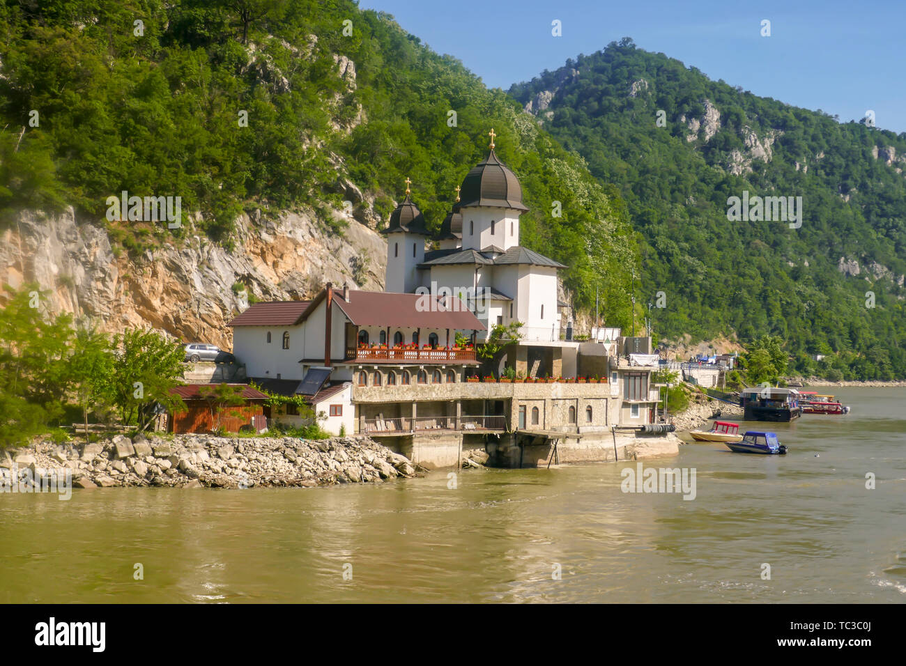 Mraconia Monastery on banks of  the Iron Gate gorges on the Danube River between Serbia and Romania. Stock Photo