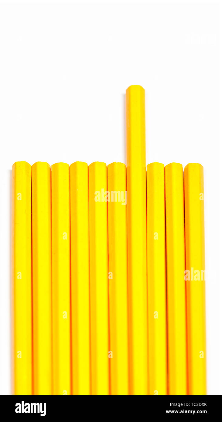 A neatly arranged yellow pencil. Stock Photo