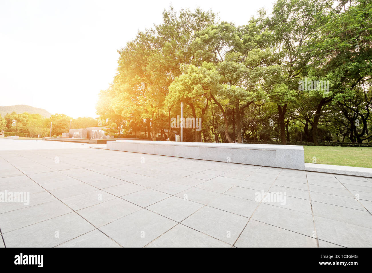 Empty marble floor near green forest Stock Photo