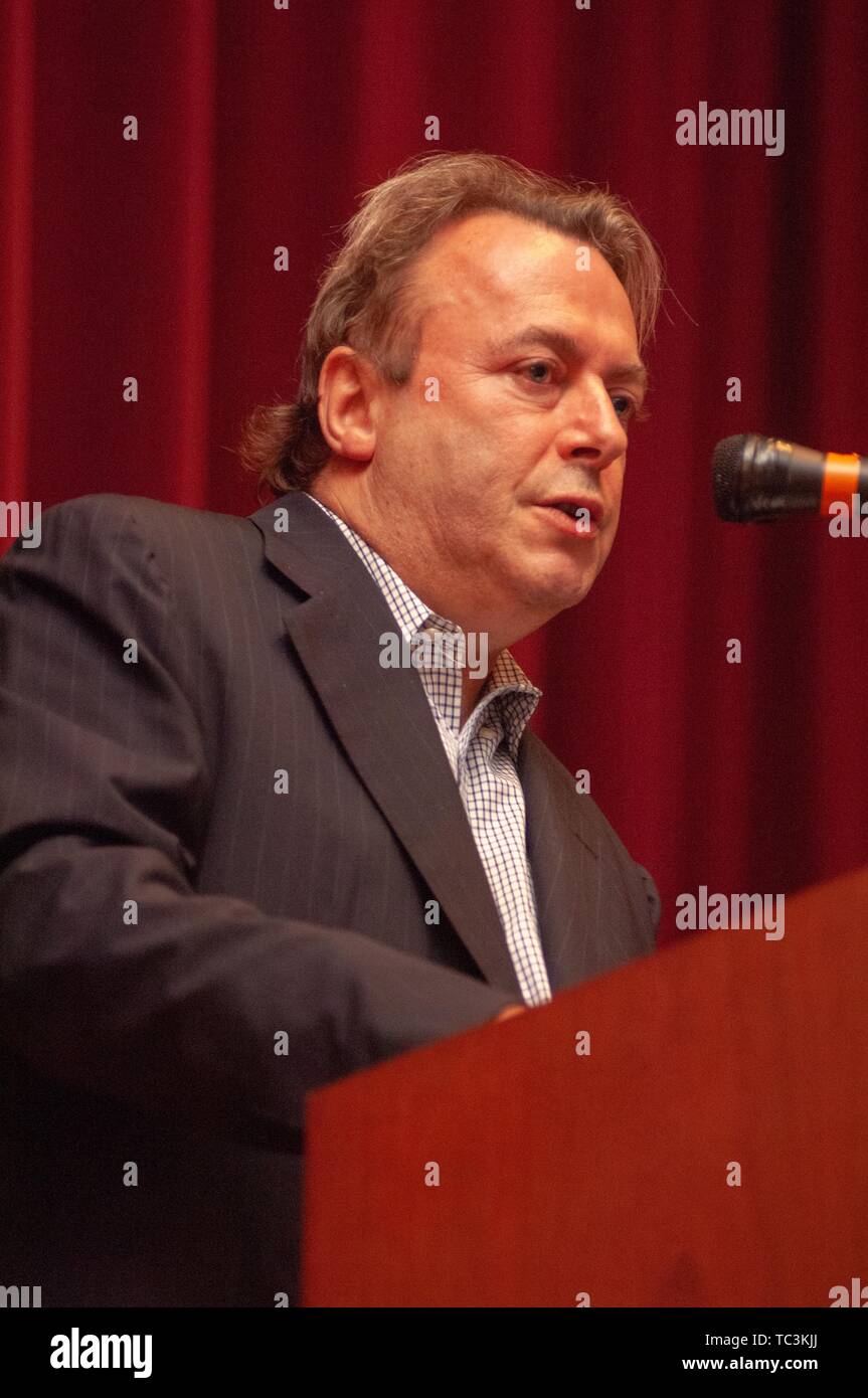 Low angle, close-up profile shot of journalist Christopher Hitchens (1949 - 2011) speaking from a podium during a Milton S Eisenhower Symposium, Homewood Campus of Johns Hopkins University, Baltimore, Maryland, September 18, 2007. From the Homewood Photography Collection. () Stock Photo