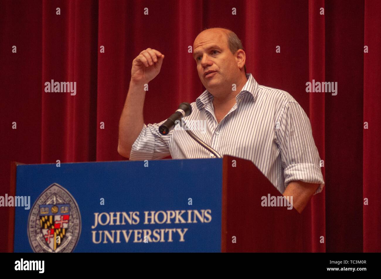 David Simon, a television producer and creator of HBO television show The Wire, speaks at a podium at the Johns Hopkins University, Baltimore, Maryland, September 26, 2007. From the Homewood Photography Collection. () Stock Photo