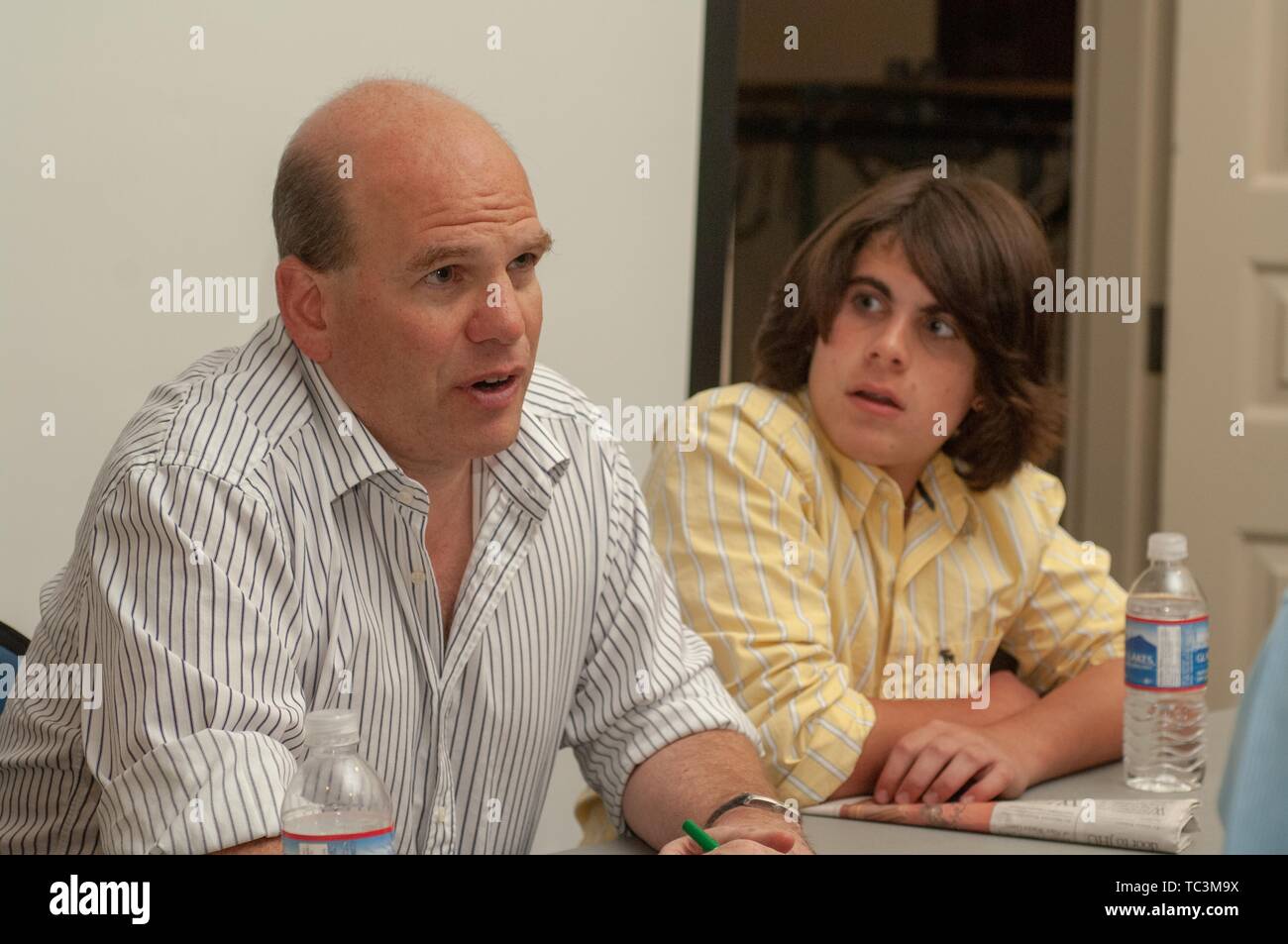 David Simon, a television producer and creator of HBO television show The Wire, seated at a table at the Johns Hopkins University, Baltimore, Maryland, September 26, 2007. From the Homewood Photography Collection. () Stock Photo