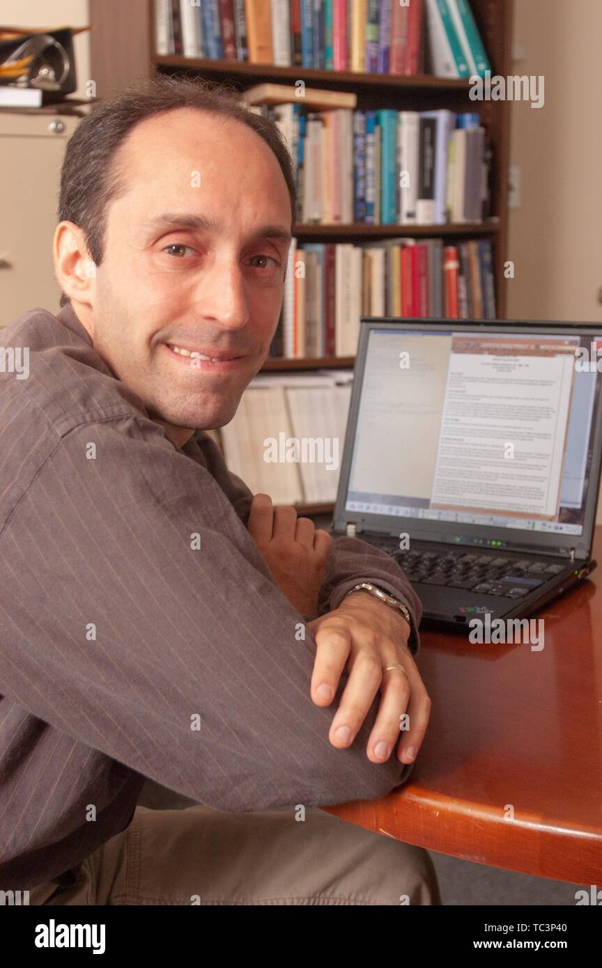 Close-up of Center for Language and Speech Processing Professor Jason Eisner, smiling towards the camera, at the Johns Hopkins University, Baltimore, Maryland, July 11, 2005. From the Homewood Photography Collection. () Stock Photo