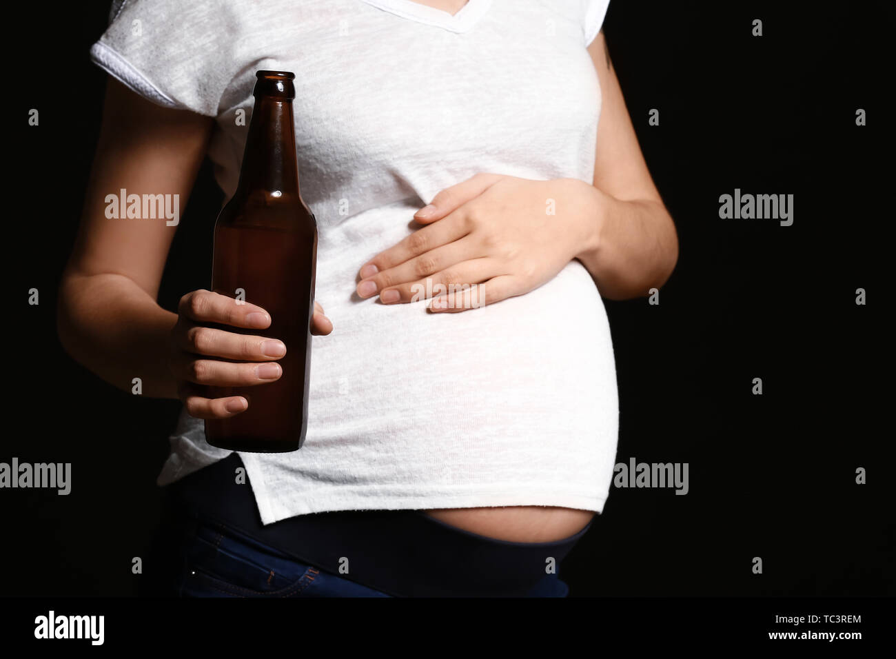 Pregnant Woman Drinking Beer High Resolution Stock Photography and