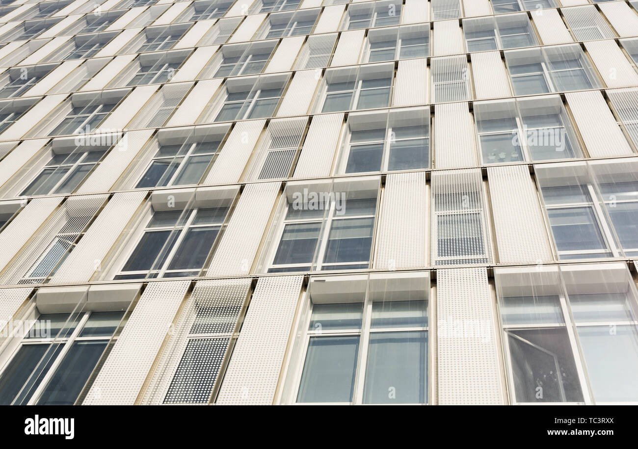 part of modern business building against blue sky Stock Photo - Alamy