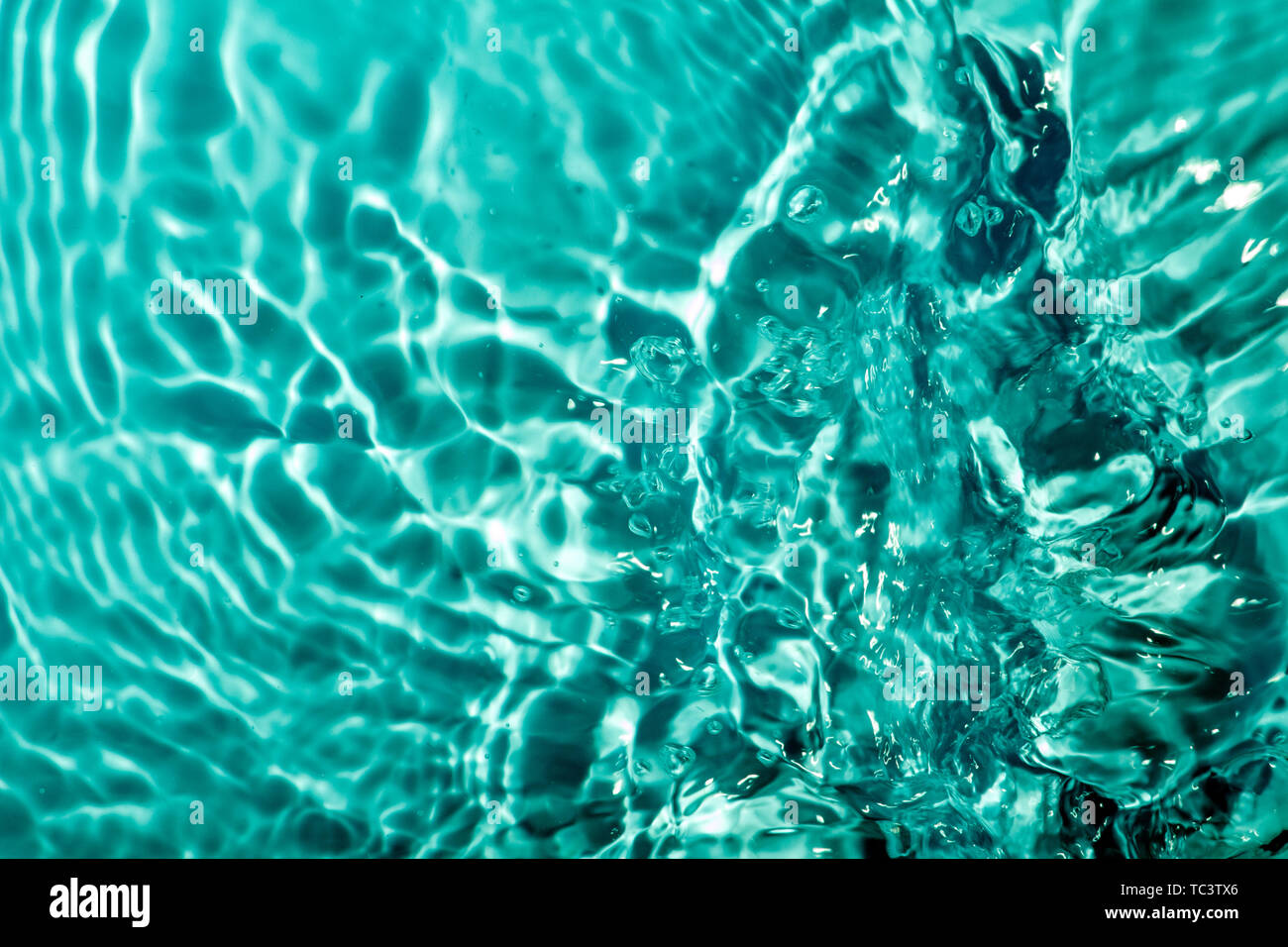 Crystal clear water ripples Stock Photo - Alamy