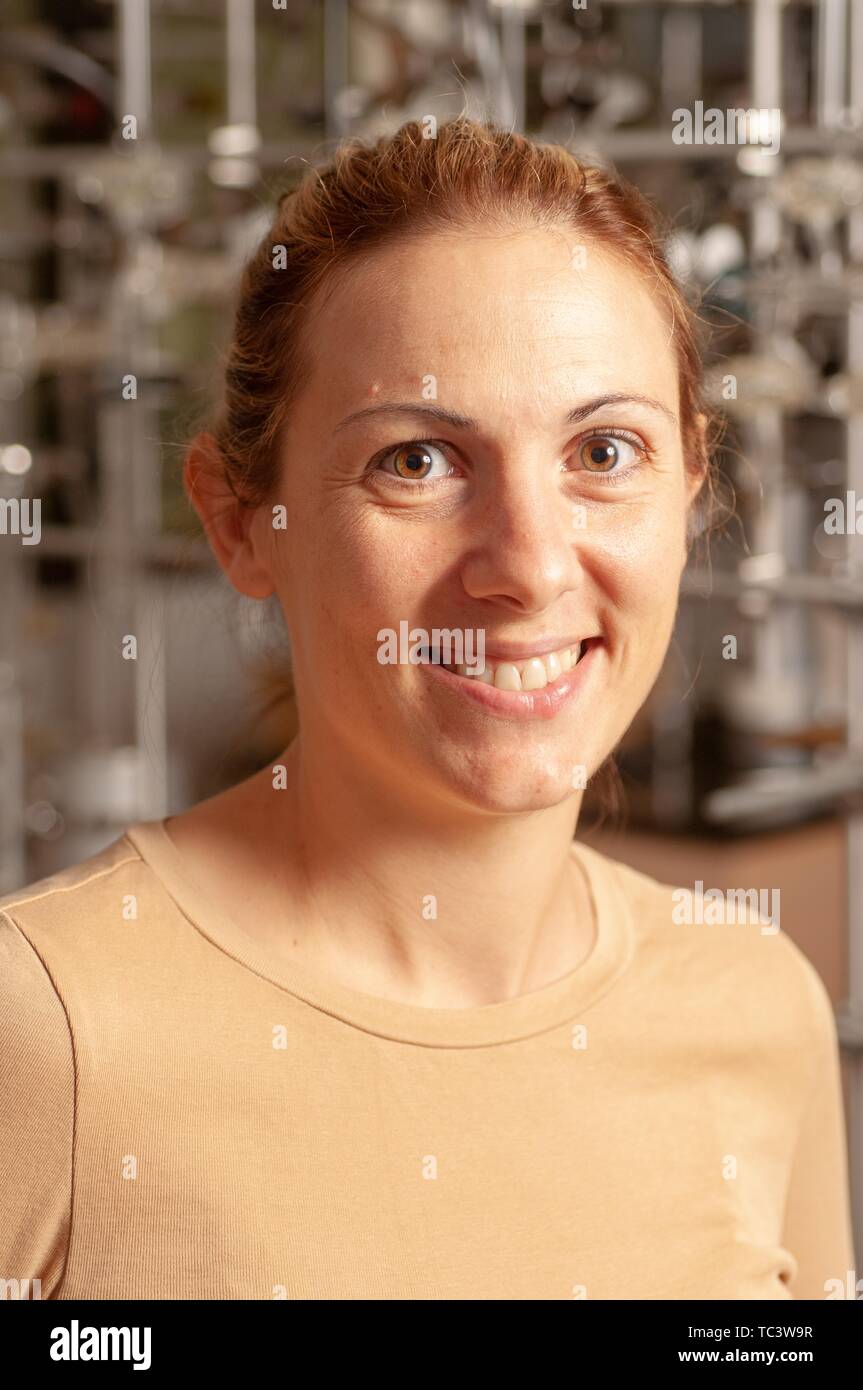 Close-up shot of geoscientist Hope Jahren, smiling at the camera, in an Earth and Planetary Sciences lab room at the Johns Hopkins University, Baltimore, Maryland, September 28, 2007. From the Homewood Photography Collection. () Stock Photo