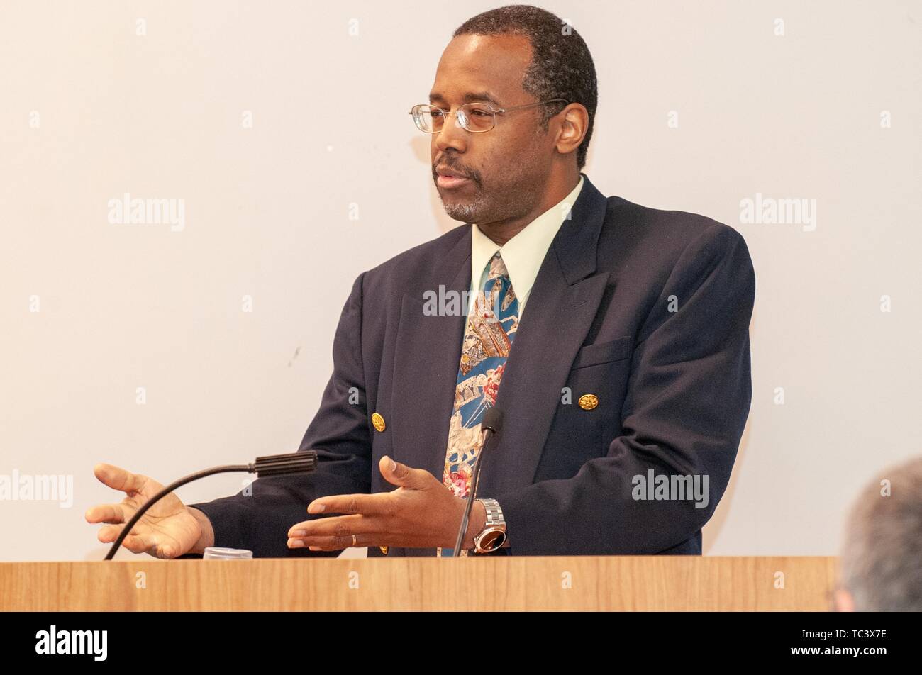 Three-quarter profile view of neurosurgeon Ben Carson speaking from a podium during the Minority Pre-Health Conference at the Johns Hopkins University, Baltimore, Maryland, March, 2008. From the Homewood Photography Collection. () Stock Photo
