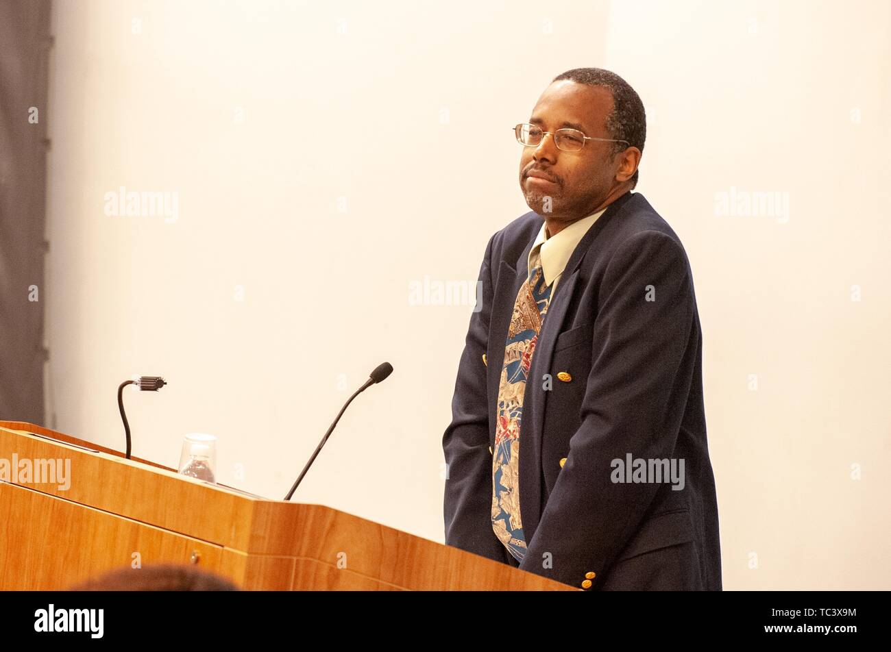 Three-quarter profile view of keynote speaker Ben Carson standing at a podium during the Minority Pre-Health Conference at the Johns Hopkins University, Baltimore, Maryland, February 29, 2008. From the Homewood Photography Collection. () Stock Photo