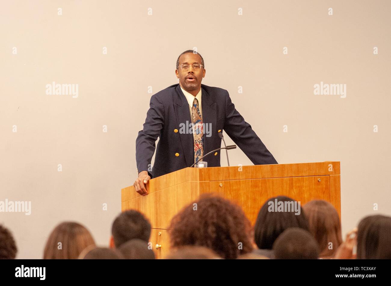 Neurosurgeon and politician Ben Carson, from the waist up, speaking from a podium during the Minority Pre-Health Conference at the Johns Hopkins University, Baltimore, Maryland, February 29, 2008. From the Homewood Photography Collection. () Stock Photo