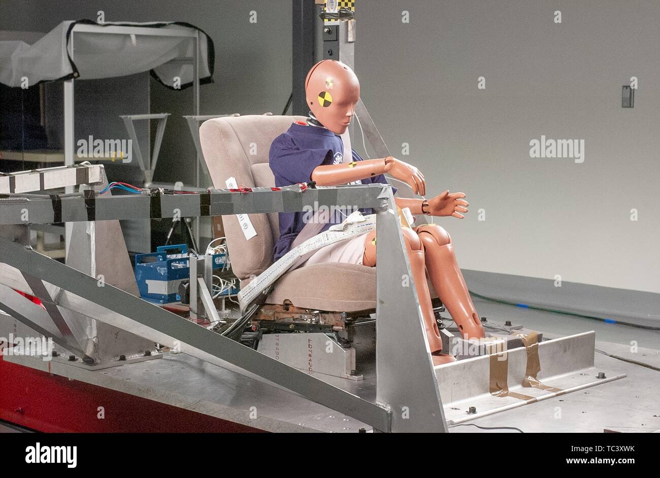 Three-quarter profile view of a seated crash dummy in the Impact Biomechanics Test Facility at the Johns Hopkins University Applied Physics Laboratory, May 3, 2004. From the Homewood Photography Collection. () Stock Photo