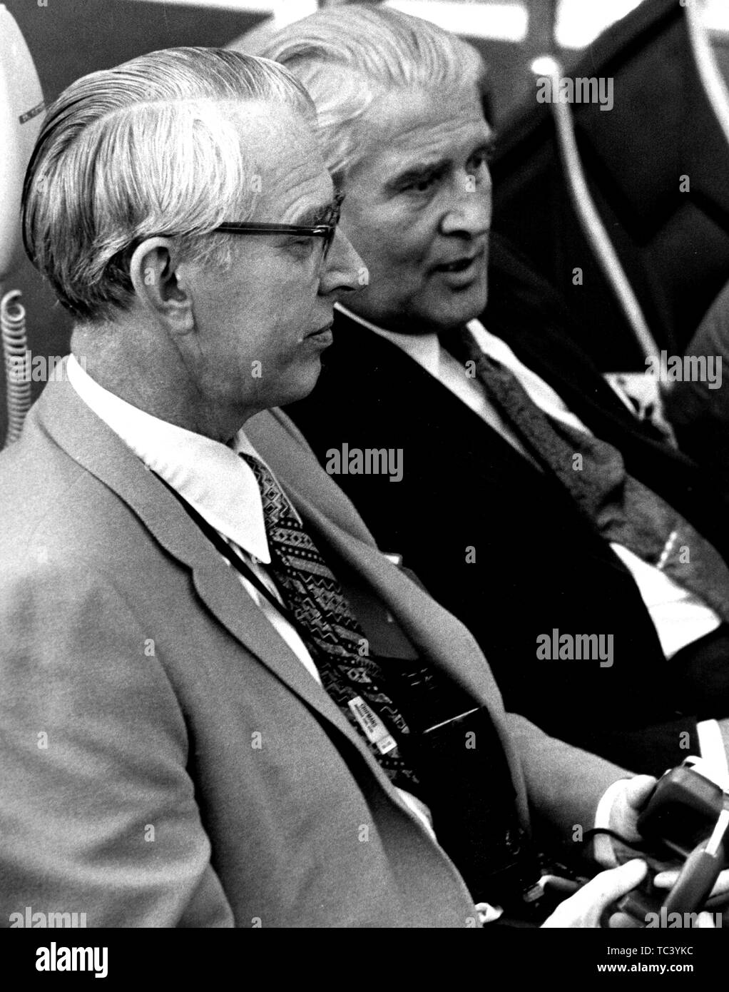 Dr James C Fletcher and Dr Wernher von Braun monitor Apollo 15 prelaunch activities in Firing Room 1 of the Launch Control Center and the Kennedy Space Center, Florida, 1971. Image courtesy National Aeronautics and Space Administration (NASA). () Stock Photo