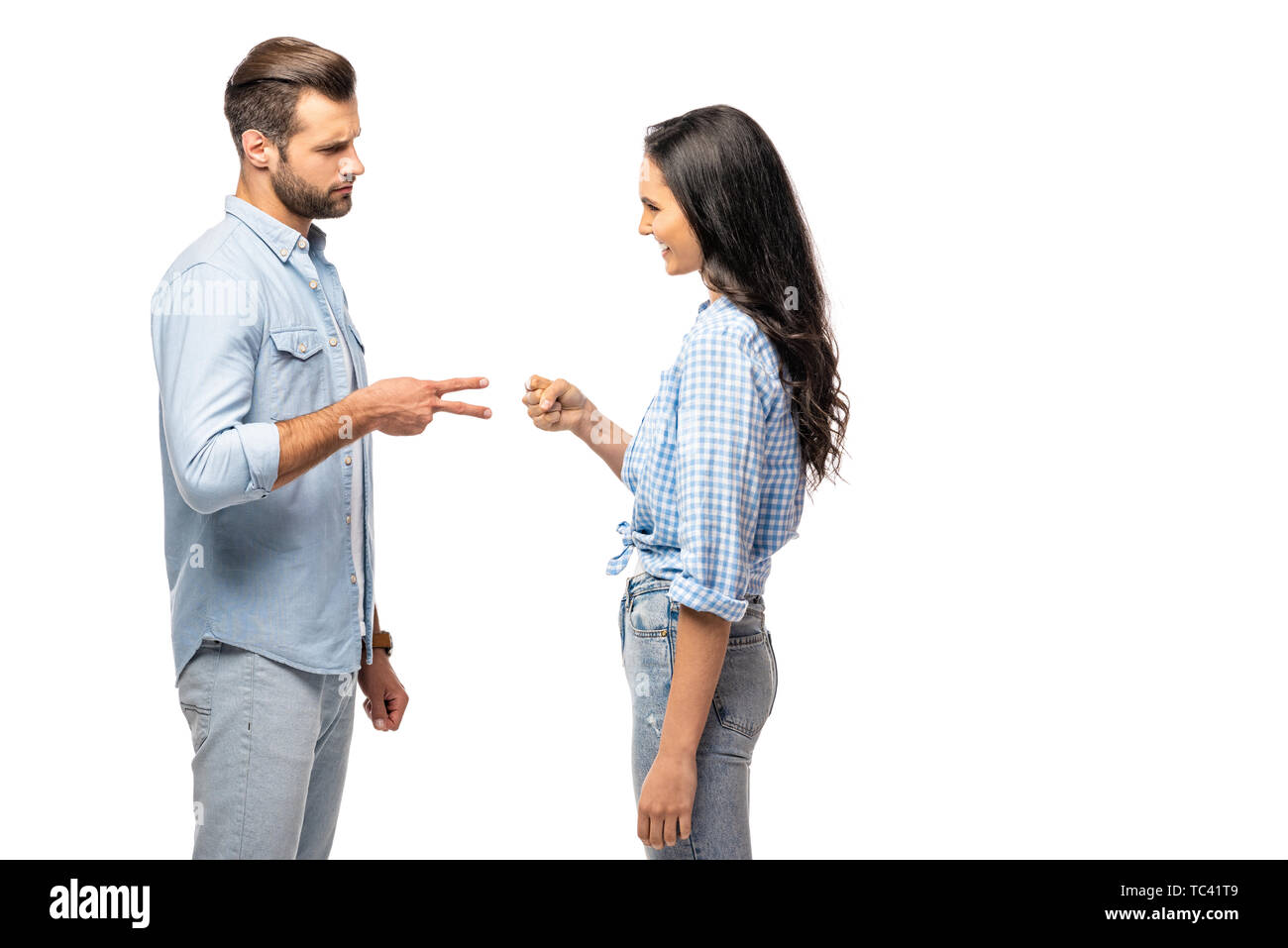 man and young woman playing rock-paper 
