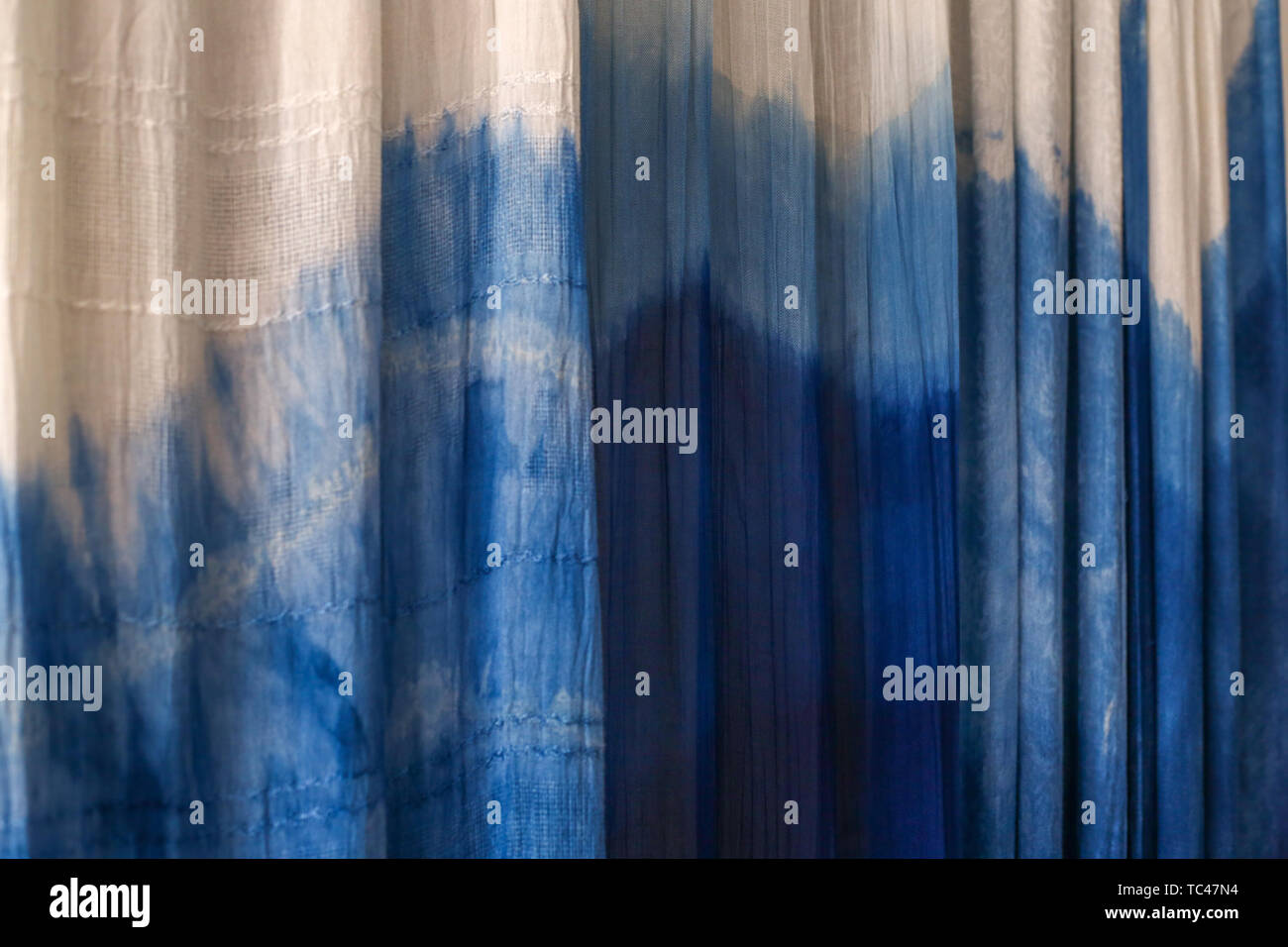 Batik braid glowing dots abstract background Stock Photo