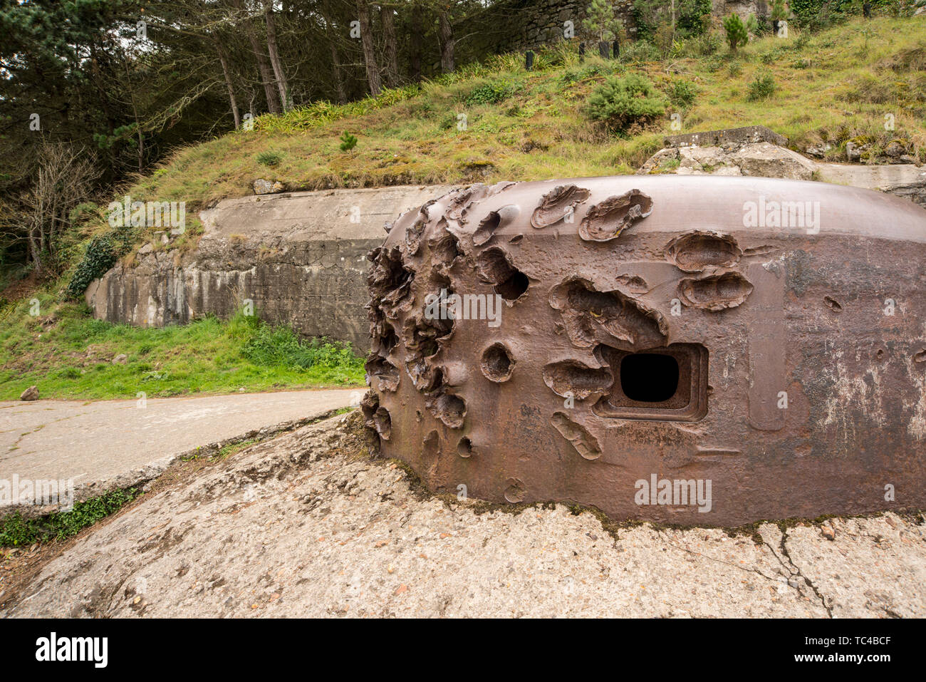 World War 2 metal bunker with numerous damages caused by attacks, La Cité d'Alet (or Aleth), Saint Malo, Brittany, France Stock Photo