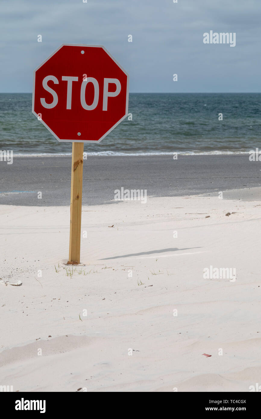 Mexico Beach, Florida - A sign urges motorists to stop before driving into the Gulf of Mexico. Stock Photo