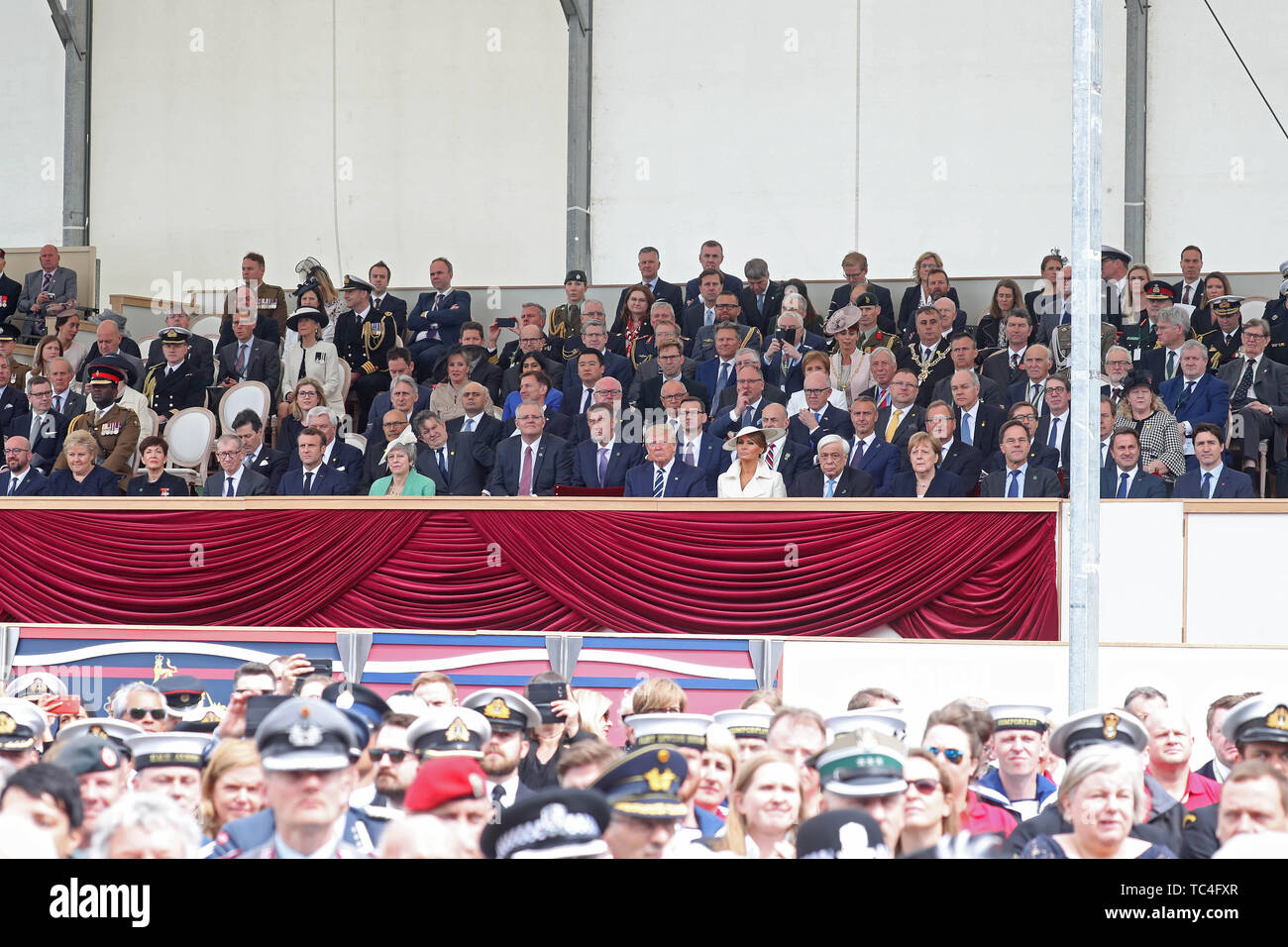 (front row, left to right) Prime Minister of Belgium Charles Michel, Prime Minister of of Norway Erna Solberg, Governor-General of New Zealand Patsy Reddy, Philip May, President of the France Emmanuel Macron, Prime Minister Theresa May, US President Donald Trump, Melania Trump, President of Greece Prokopis Pavlopoulos, German Chancellor Angela Merkel, Prime Minister of the Netherlands Mark Rutte, Prime Minister of Luxembourg Xavier Bettel, and Prime Minister of Canada Justin Trudeau, during commemorations for the 75th Anniversary of the D-Day landings at Southsea Common, Portsmouth. Stock Photo