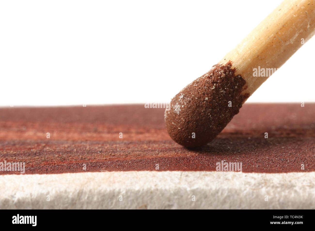 Striking of match on white background, closeup Stock Photo Alamy