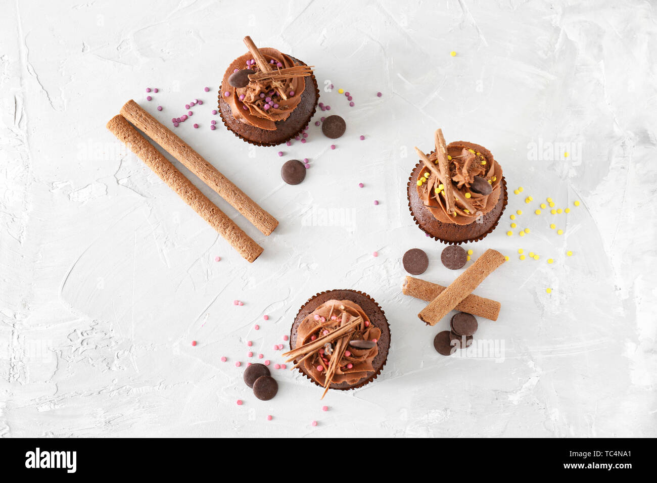 Tasty chocolate cupcakes on light background Stock Photo