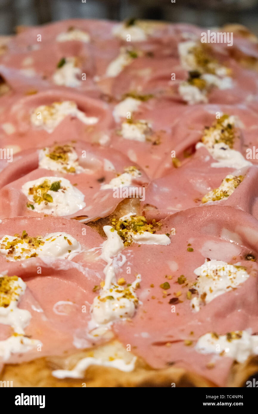 Roman style pizza in pala , high idration , sell by the slice in a